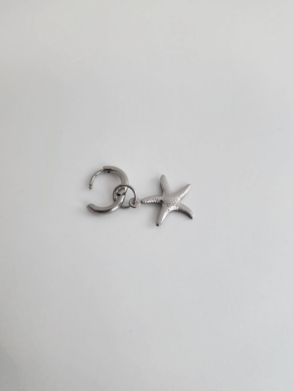 Charm étoile en Acier Inoxydable